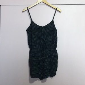 Black romper with white polka dots